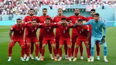Why did Iran's players refuse to sing their national anthem?