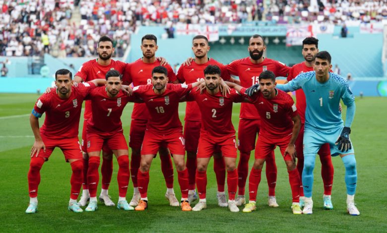 Why did Iran's players refuse to sing their national anthem?