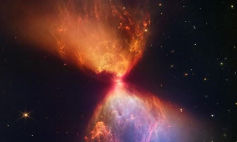 James Webb Telescope detected Majestic Hourglass of Dust Around Young Star