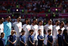 Iran players sing national anthem at World Cup following Tehran threats