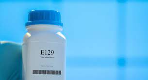 Food coloring E129, a health risk