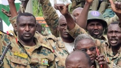 What is behind the arming of the Sudanese army for prisoners and outcast figures? 