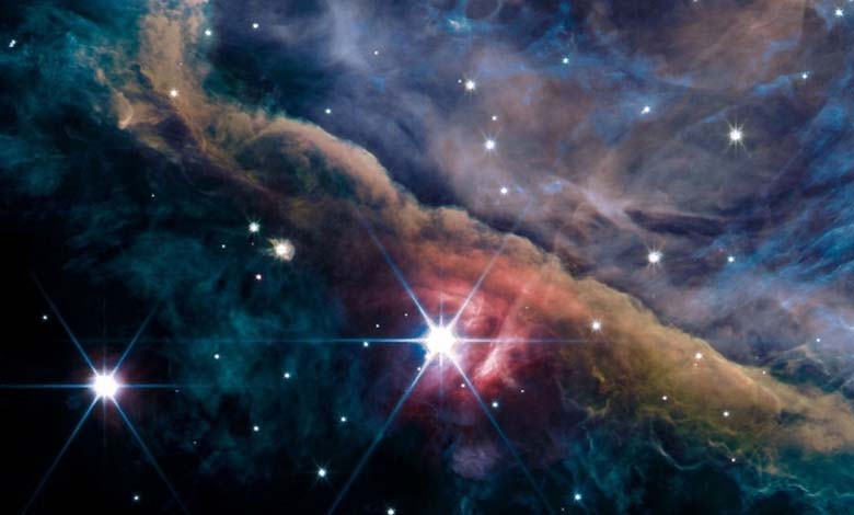 The Massive Star Factory... "Web" captures stunning cosmic image in 4 colors