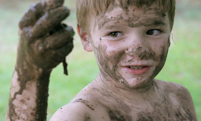 How Playing in the Mud Boosts a Child's Immune System