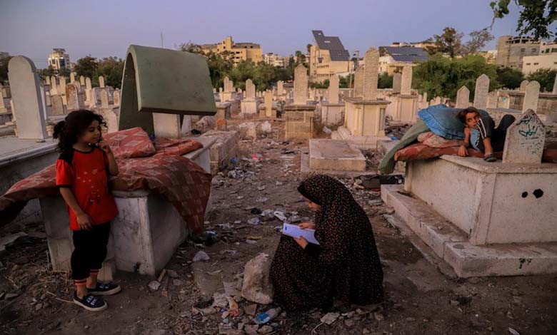 Displaced in a cemetery: Gaza’s living seek refuge among the dead