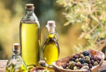 What does one tablespoon of olive oil a day do for your blood pressure?