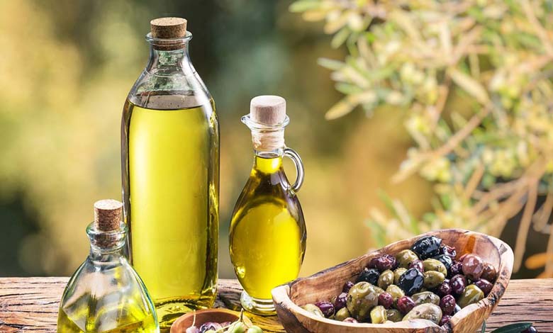 What does one tablespoon of olive oil a day do for your blood pressure?