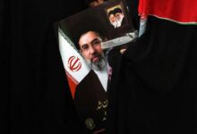How does the Iranian regime buy the loyalty of its supporters?
