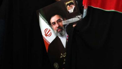 How does the Iranian regime buy the loyalty of its supporters?