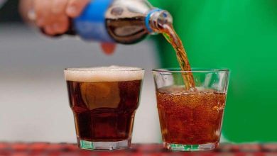 How do dark carbonated beverages affect kidney health? Mechanisms and metabolic implications