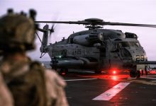 How did the U.S. military rescue its pilots from the waters of the Strait of Hormuz?